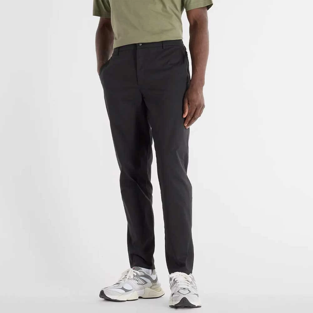 МЪЖКИ ПАНТАЛОН NEW BALANCE MP43554BK PANT ATHLETICS STANDARD TAPERED PANT 30IN ЧЕРЕН - lotus-sport.bg
