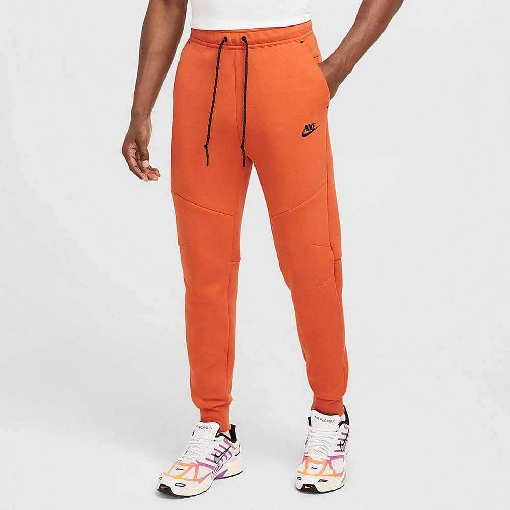 МЪЖКО ДОЛНИЩЕ NIKE HV0959-846 TCH FLC JGGR ОРАНЖЕВО - lotus-sport.bg