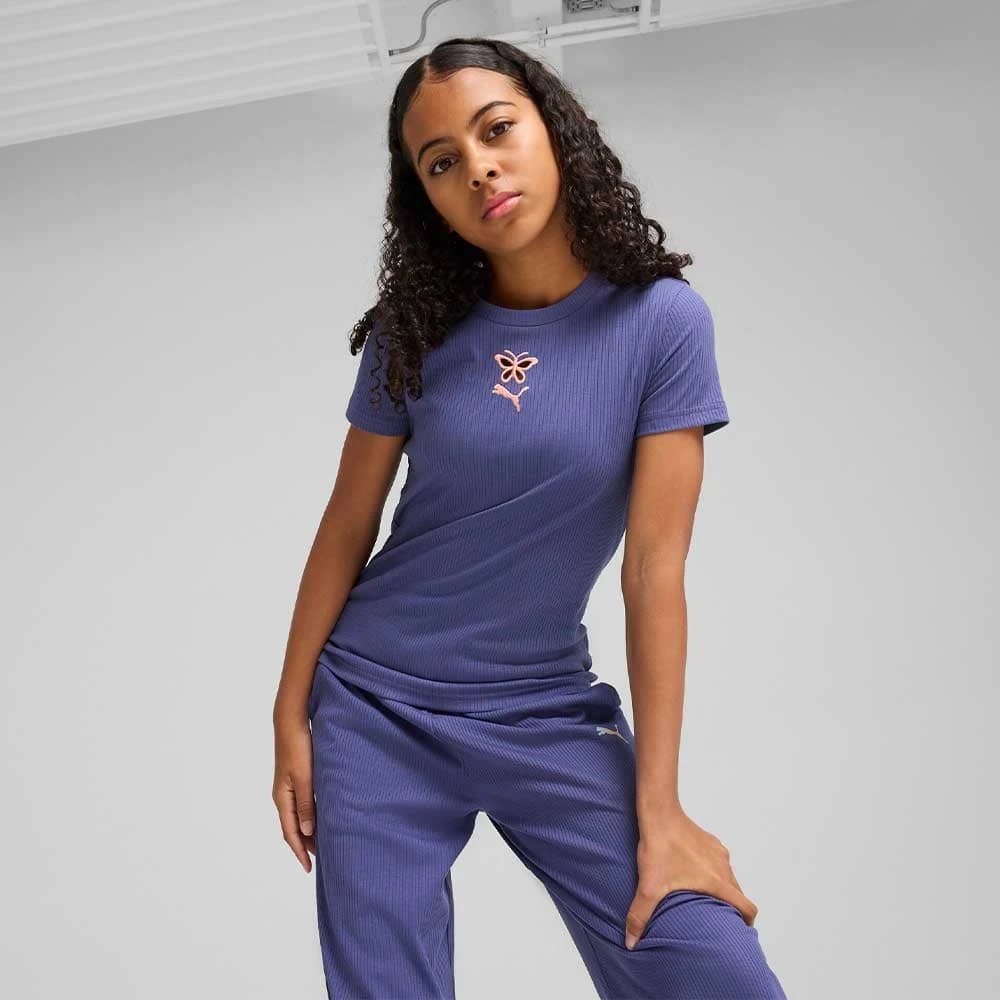 ДЕТСКА ТЕНИСКА ЗА МОМИЧЕ PUMA 63074546 GRAPHICS RIBBED TEE IV G СИНЯ - lotus-sport.bg