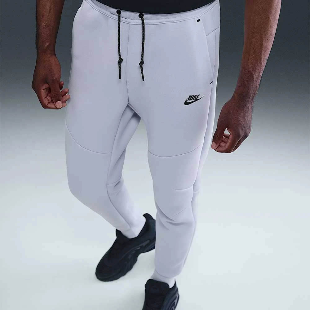 МЪЖКО ДОЛНИЩЕ NIKE HV0959-057 TCH FLC JGGR СИВО-СИНЬО - lotus-sport.bg