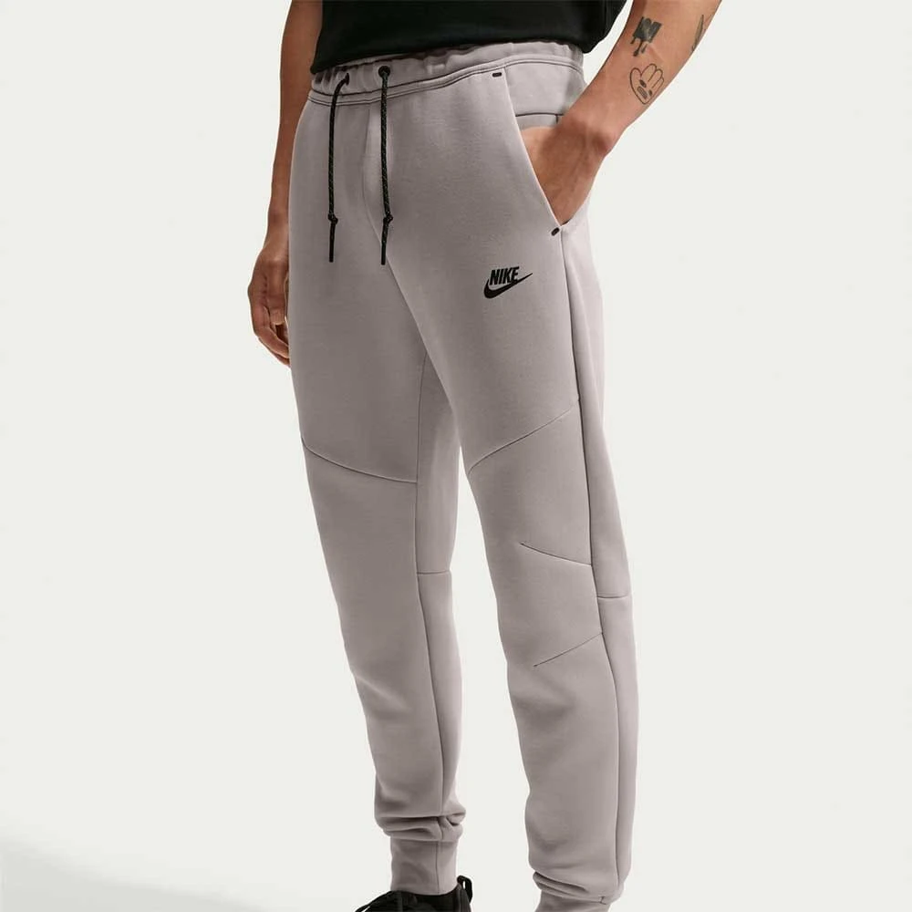 МЪЖКО ДОЛНИЩЕ NIKE HV0959-009 TCH FLC JGGR СВЕТЛОСИВО - lotus-sport.bg
