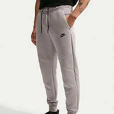 МЪЖКО ДОЛНИЩЕ NIKE HV0959-009 TCH FLC JGGR СВЕТЛОСИВО МЪЖКО ДОЛНИЩЕ NIKE HV0959-009 TCH FLC JGGR СВЕТЛОСИВО